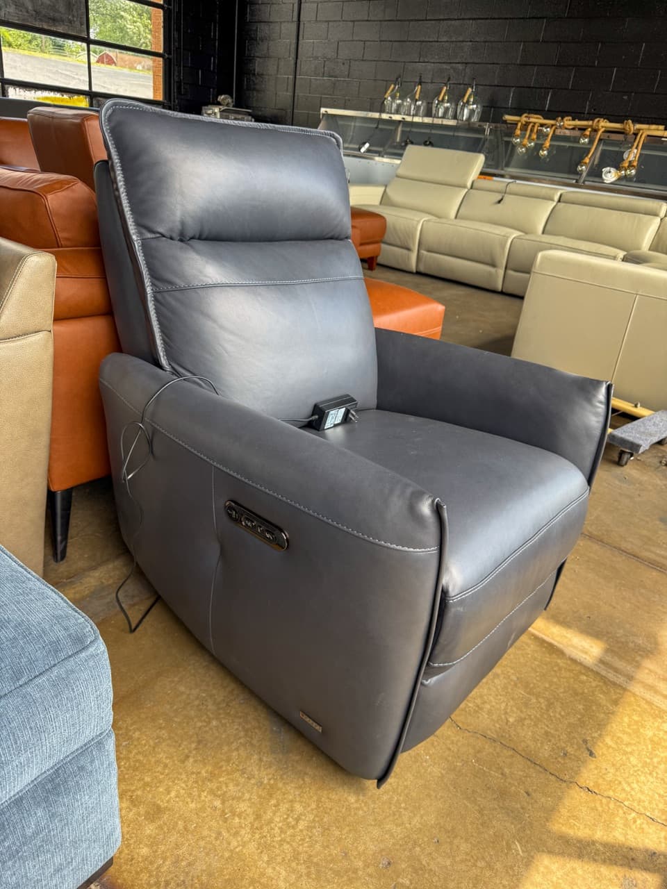 Power recliner control on a discount reclining sofa