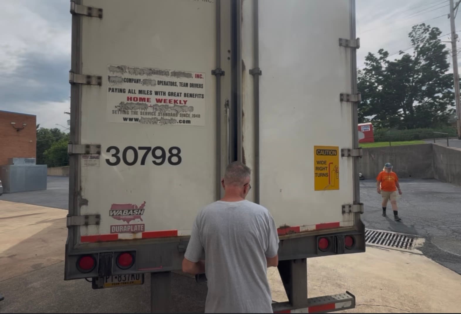 Truckload of overstock furniture unloading at a Shenandoah Valley furniture warehouse